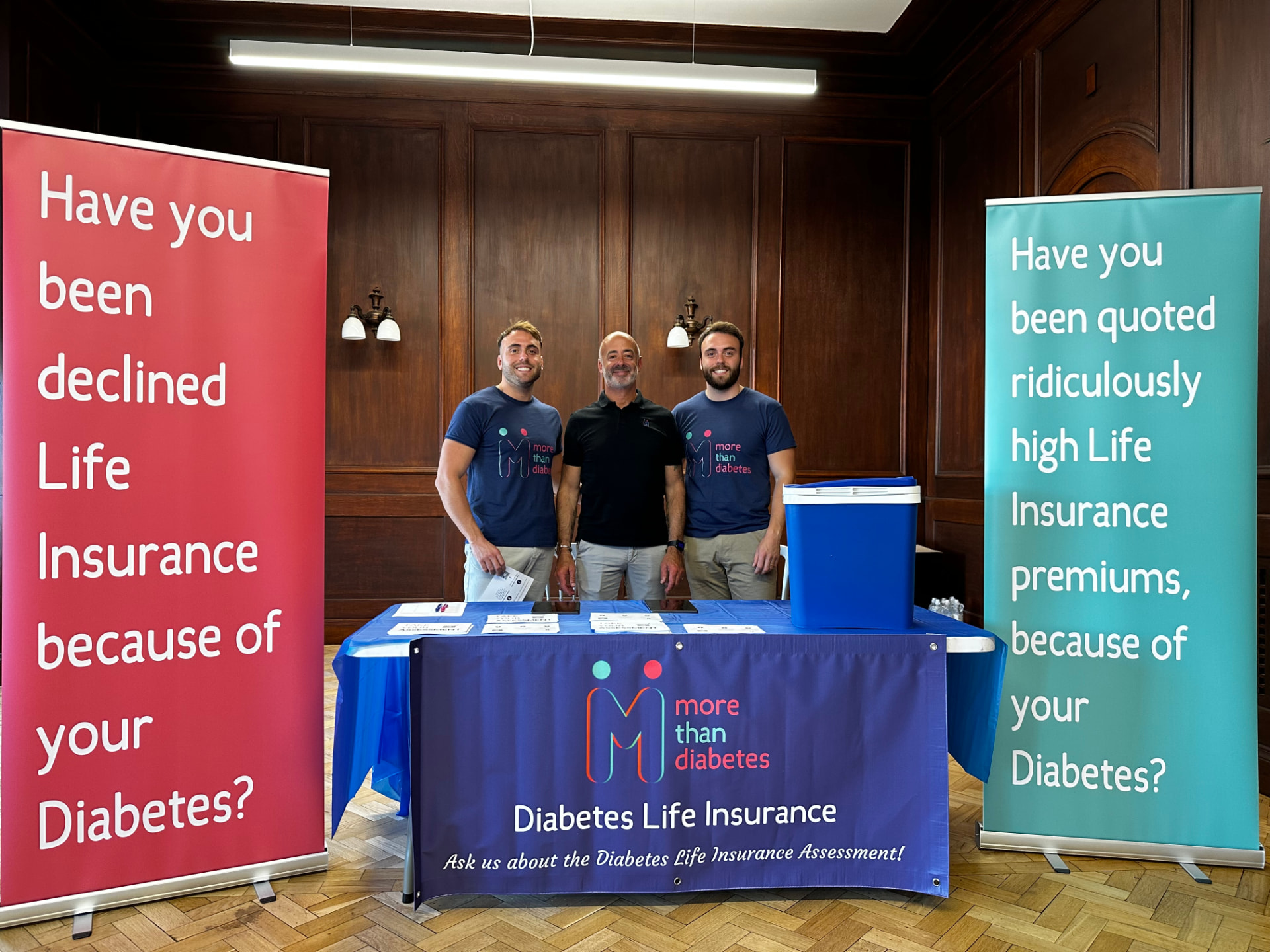 Andy, Sam and Luke Stevens, the directors of More Than Epilepsy, at their stand